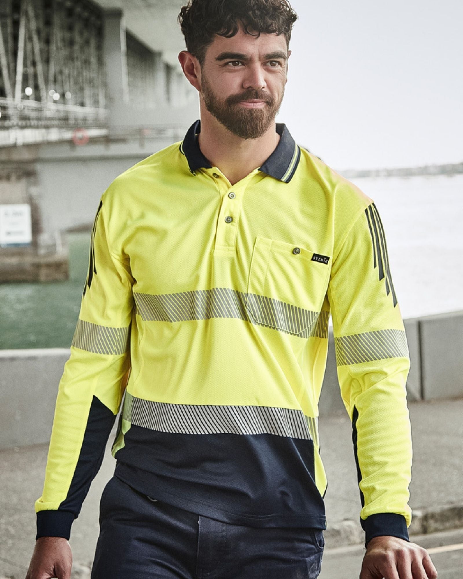 Syzmik Mens Hi Vis Flux Segmented Tape Long Sleeve Polo ZH550 